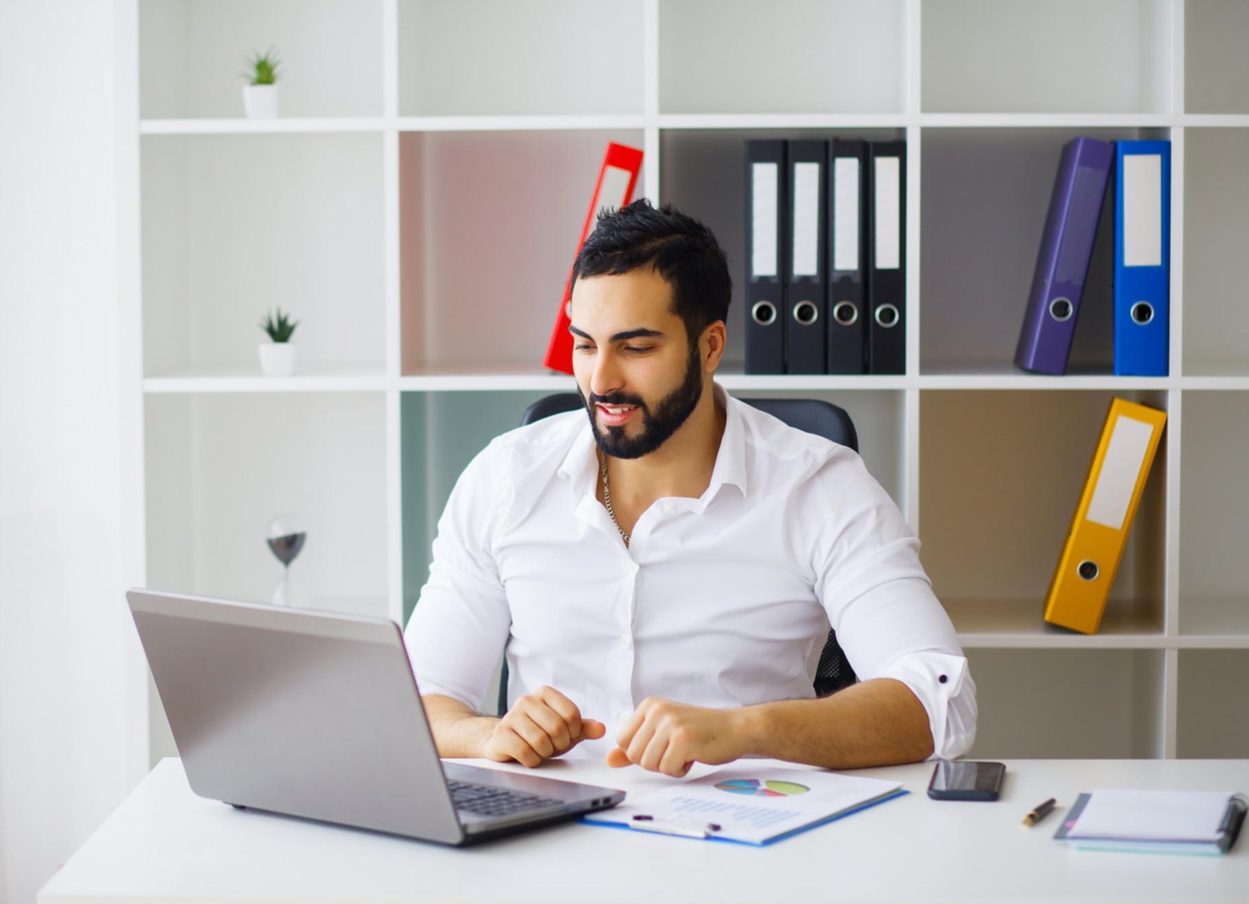 Financial professionals collaborating in a modern workspace environment